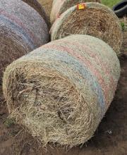 2 Round Bails Of Hay.