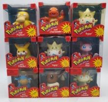 9 PokŽmon Electronic Figures including Charmander, Squirtle, and More.
