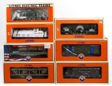(7) Lionel U.S. Army & Navy Train Cars
