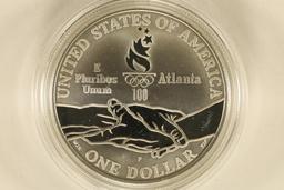 1995-P US PF SILVER $1 OLYMPIC RUNNING. IN HARD