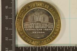 CASINO $10 SILVER TOKEN (UNC) PUTTIN ON THE RITZ