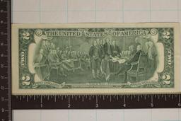 1976 CRISP UNC US $2 BILL WITH POSTAL CANCELLED
