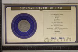 1882 MORGAN SILVER DOLLAR ON INFO CARD WITHIN