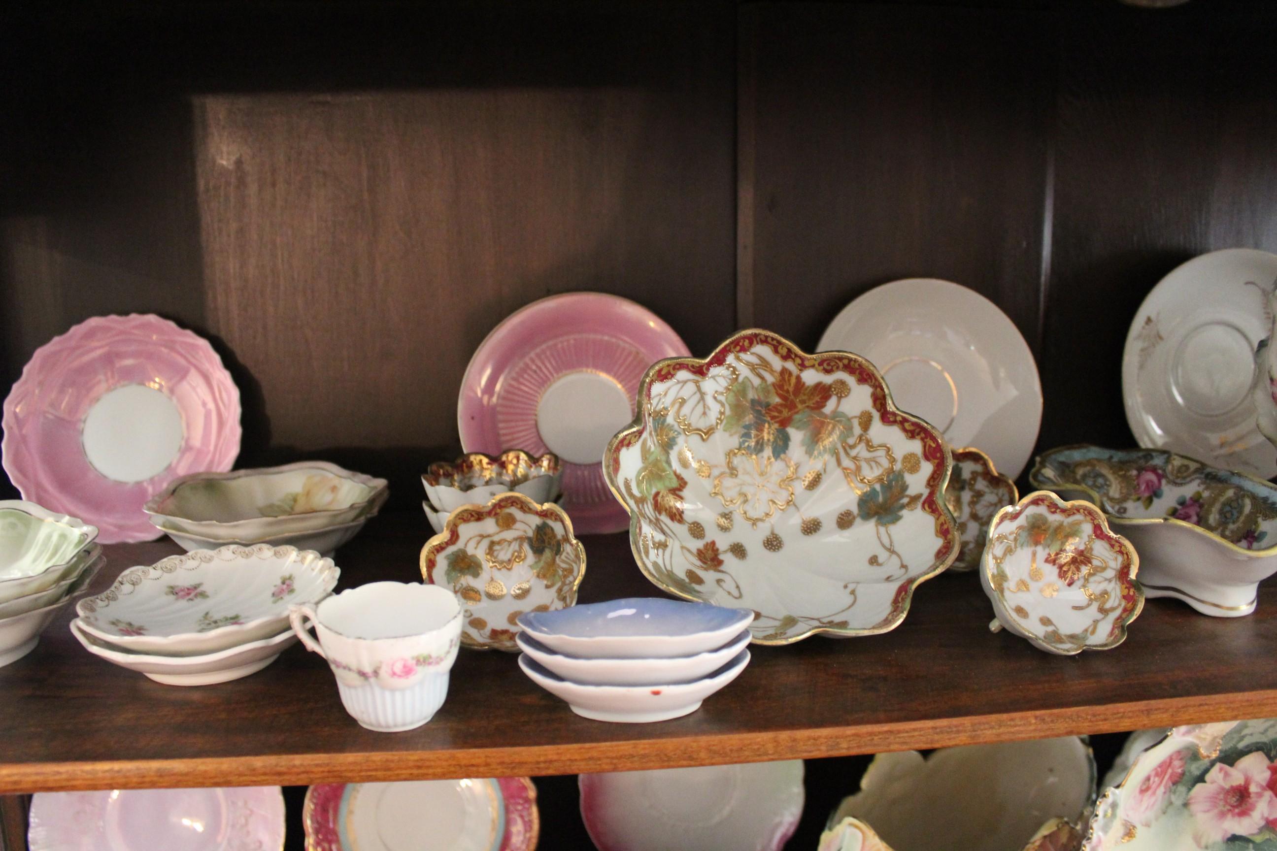 Contents of Curio Cabinet To Include: Decorative Painted Bowls, Plates, Cup