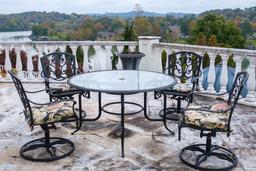 Table and 4 Chairs  Aluminum cast,  glass top,  Approx. 52" Día x 28"H - Ch