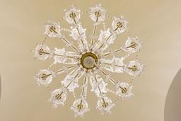 Brass and glass chandelier  2 tier , 18 light w/prisms and swags,  Approx.