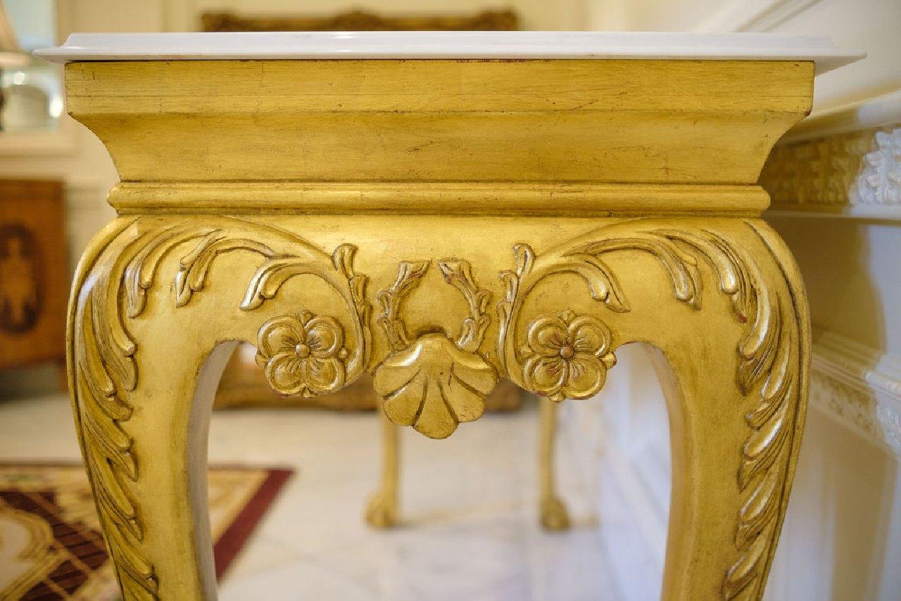 Console table gilted with acanthus carved knee, white marble top w/beveled