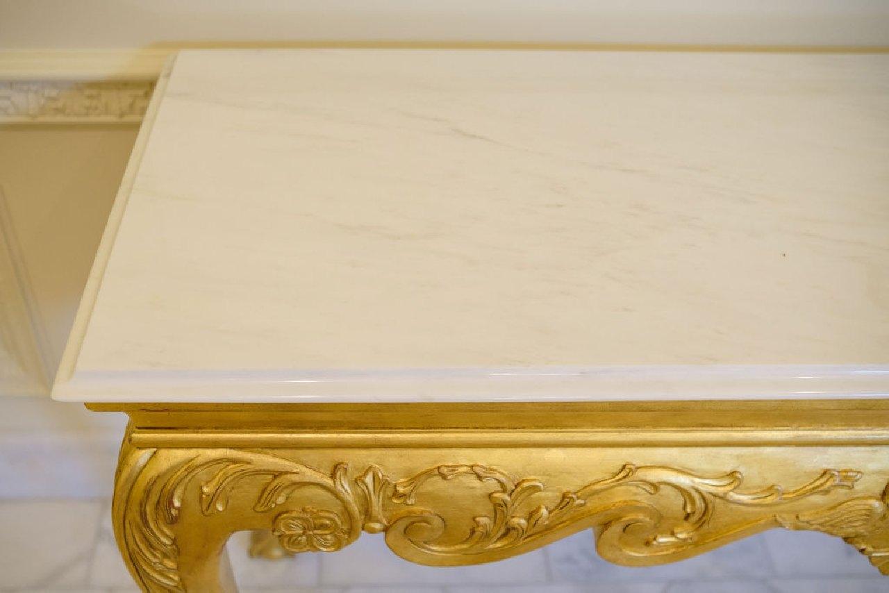 Console table gilted with acanthus carved knee, white marble top w/beveled