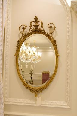 Beveled mirror Oval w/crest, rope and swag carving