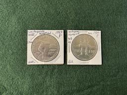 (2) Los Angeles Olympic Silver Dollars: (1) 1983 Mint Mark P Uncirculated,