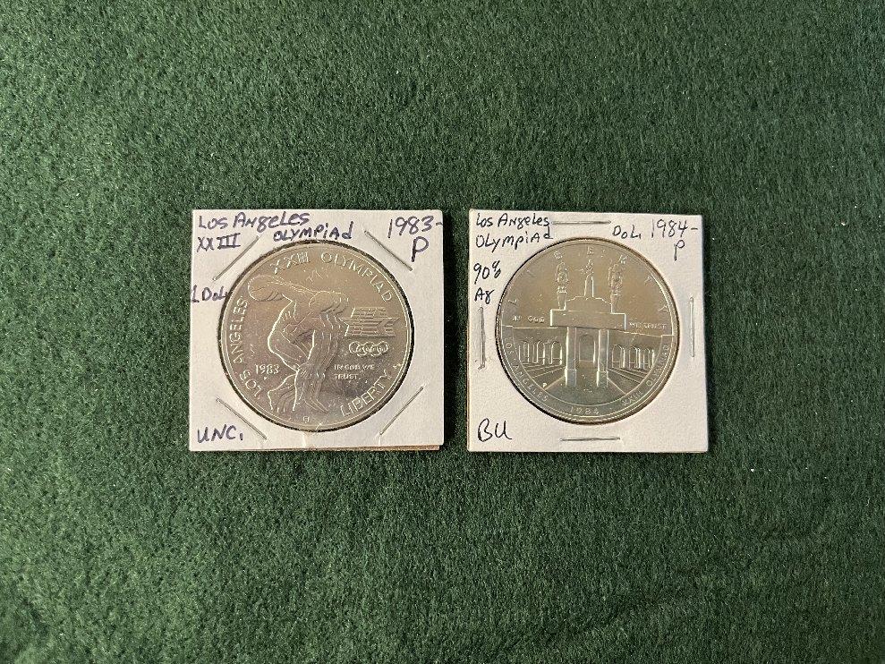 (2) Los Angeles Olympic Silver Dollars: (1) 1983 Mint Mark P Uncirculated,
