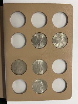 Peace Dollar Album with 10 to include: 1922, 1922-S, 1923, 1924, 1924-S, 19