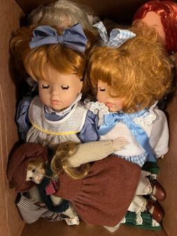 (4) Boxes of Assorted Dolls, Doll Clothing, etc.