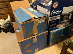 (4) Boxes of Assorted Dolls, Doll Clothing, etc.