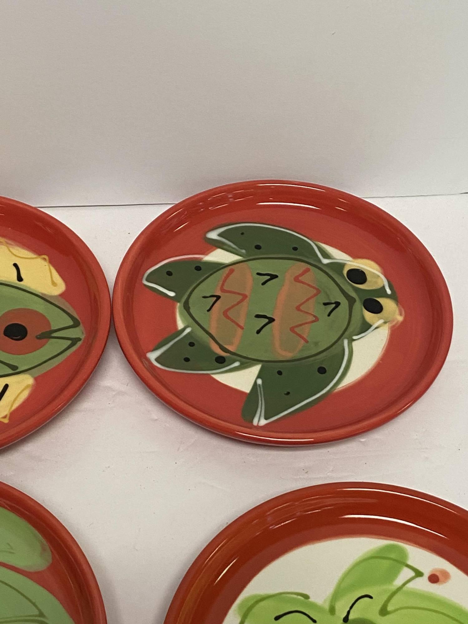 8 - 6" PLATES BY SUSAN PAINTER