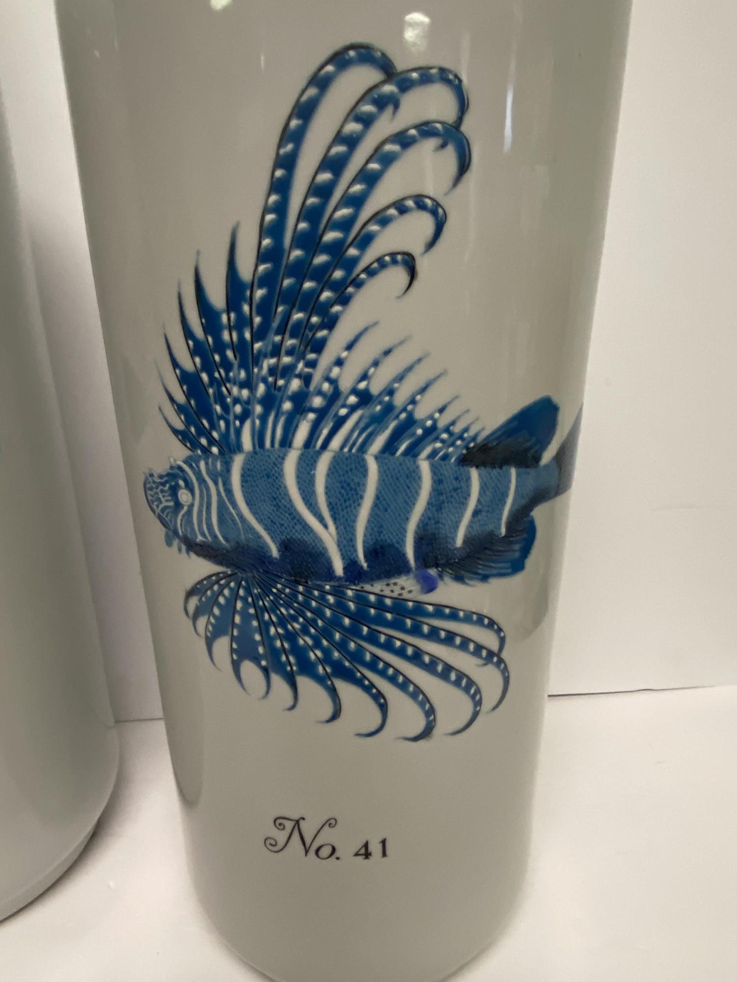 PAIR OF LARGE CERAMIC BOTTLES WITH NAUTICAL THEME