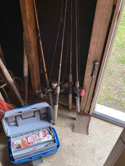 FOUR FISHING POLE AND A TACKLE BOX