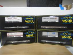 4 WEAVER   3 RAIL O GAUGE 50' FLAT CARS WITH 35' T