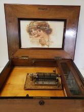 19TH C REGINA MUSIC BOX WITH 11 DISCS