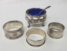 THREE STERLING NAPKIN RINGS / SALT CELLAR & SPOON