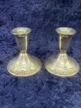 PAIR OF DUCHIN STERLING WEIGHTED CANDLE HOLDERS