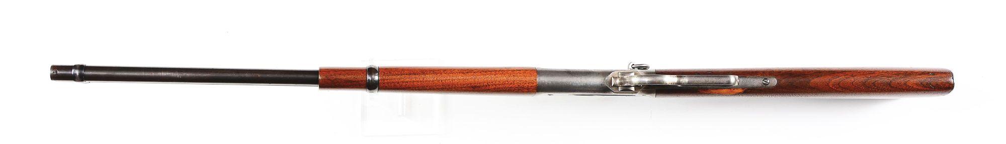 (A) Winchester Model 1886 Lever Action Saddle Ring Carbine (1892).