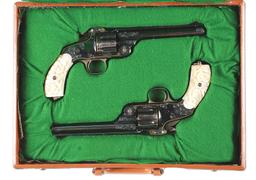 (A) Cased Pair of Japanese Engraved Smith & Wesson No. 3 Revolvers with Carved Pearl Grips.
