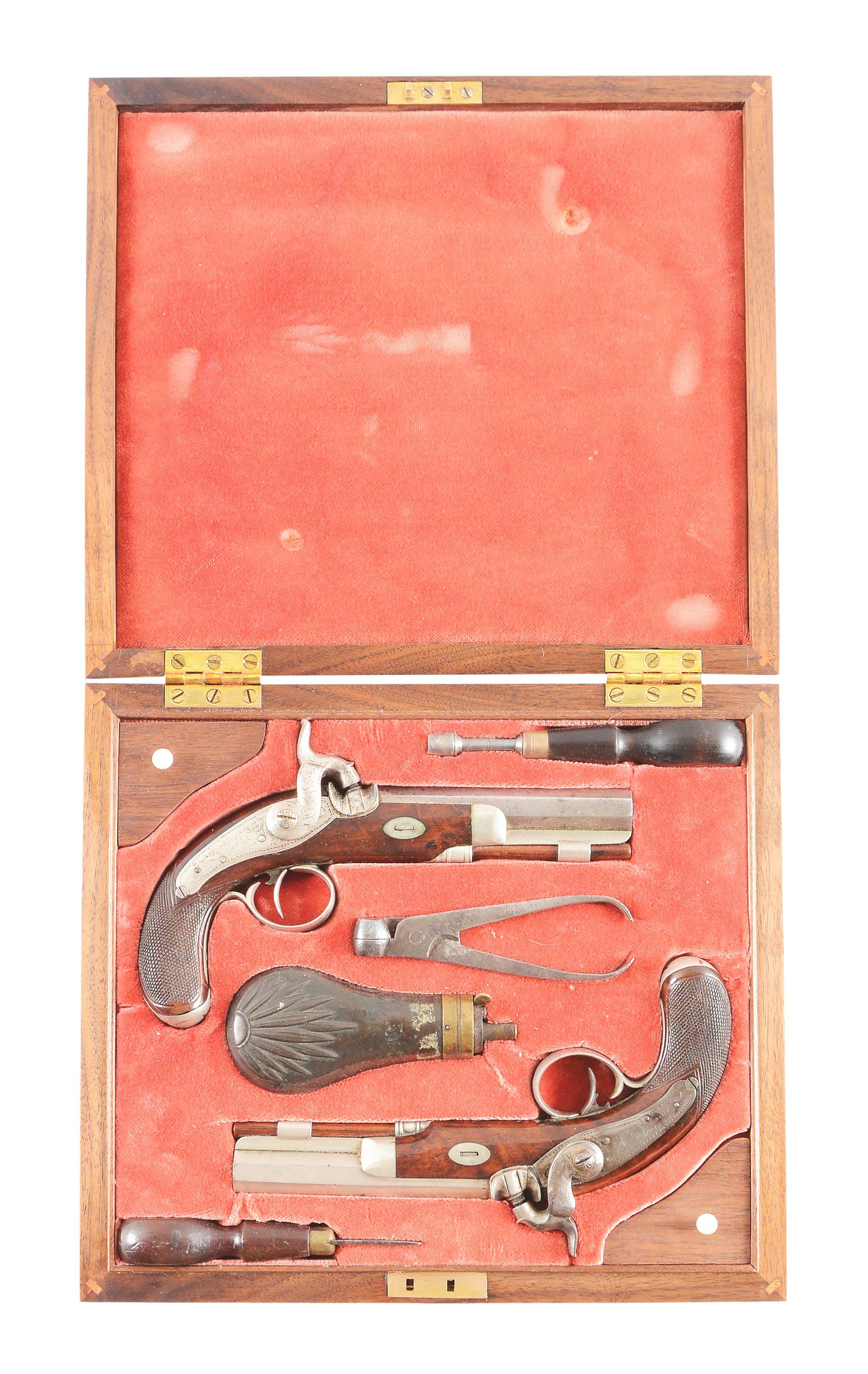 (A) AN UNUSUAL CASED PAIR OF DIMINUTIVE PERCUSSION BELT PISTOLS MARKED TRYON PHILADELPHIA ON LOCKS,