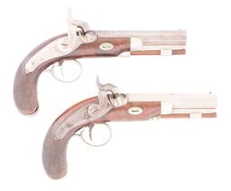 (A) AN UNUSUAL CASED PAIR OF DIMINUTIVE PERCUSSION BELT PISTOLS MARKED TRYON PHILADELPHIA ON LOCKS,