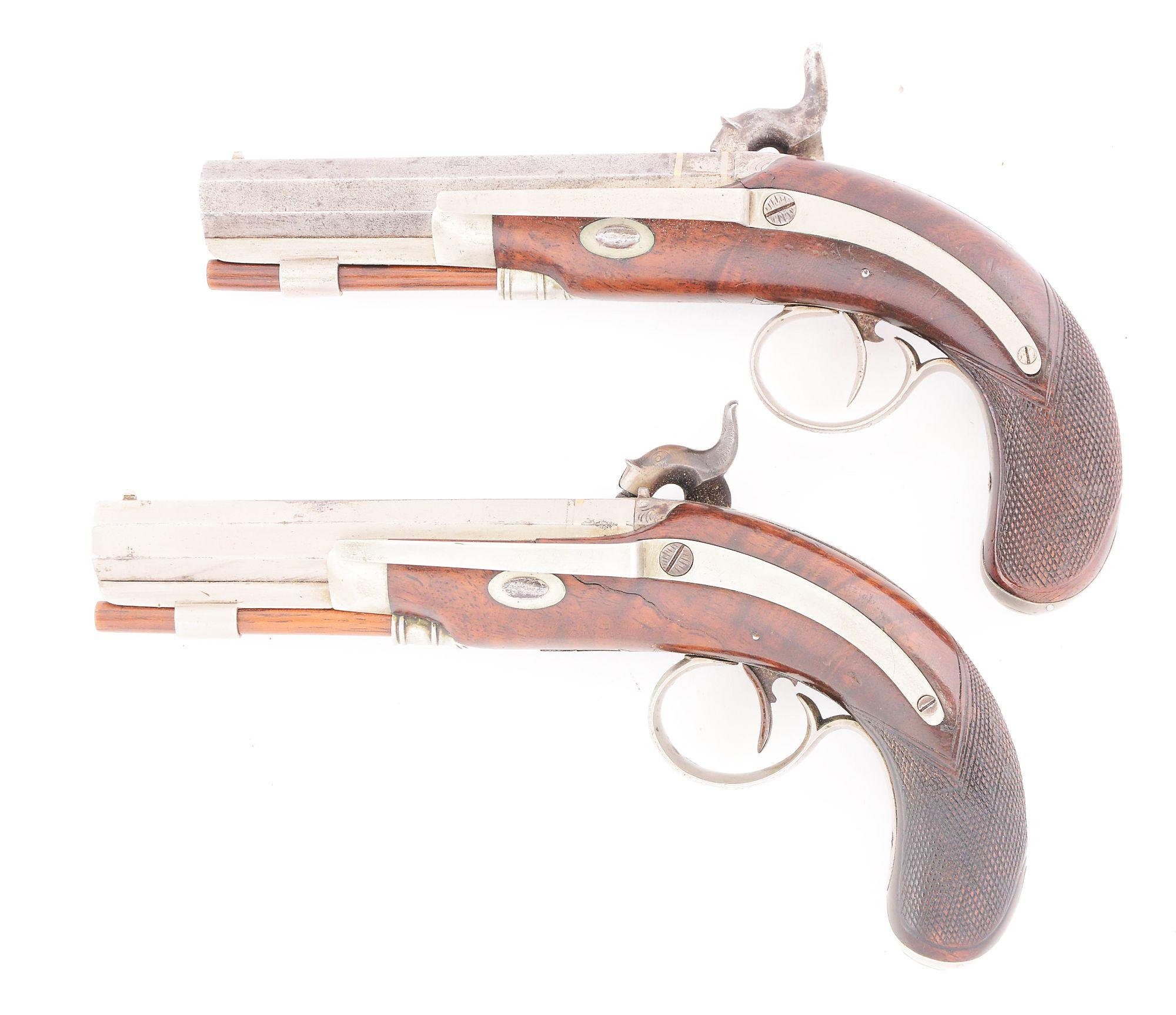 (A) AN UNUSUAL CASED PAIR OF DIMINUTIVE PERCUSSION BELT PISTOLS MARKED TRYON PHILADELPHIA ON LOCKS,