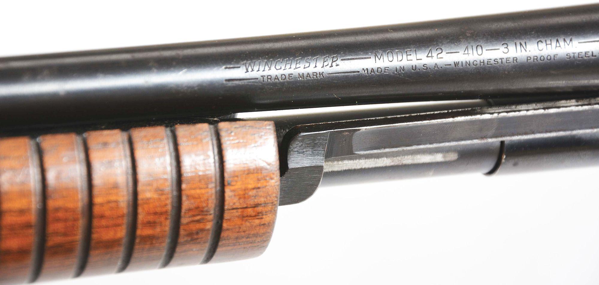 (C) WINCHESTER MODEL 42 SLIDE ACTION SHOTGUN (1960).