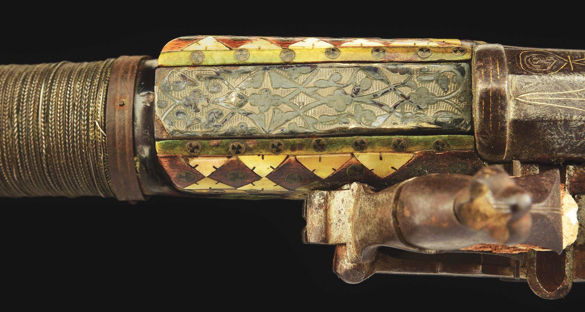 (A) AN ATTRACTIVE AND HIGHLY DECORATED CAUCASIAN MIQUELET LOCK RIFLE.