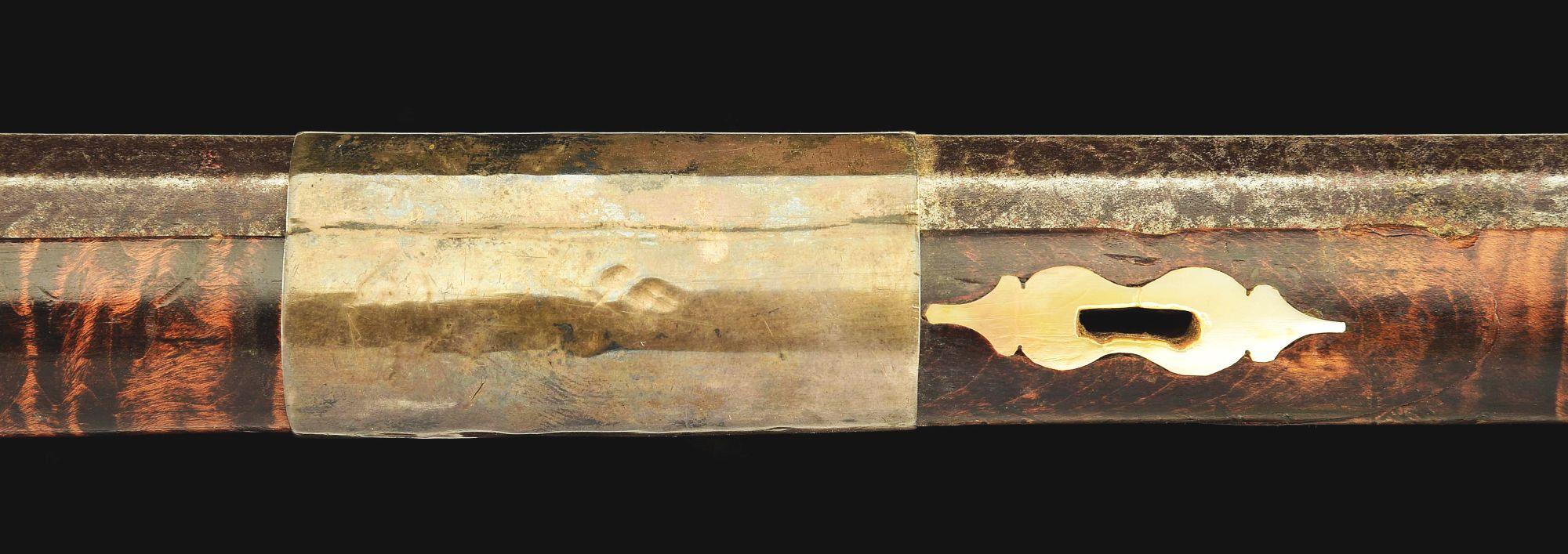 (A) AN ATTRACTIVE AND HIGHLY DECORATED CAUCASIAN MIQUELET LOCK RIFLE.