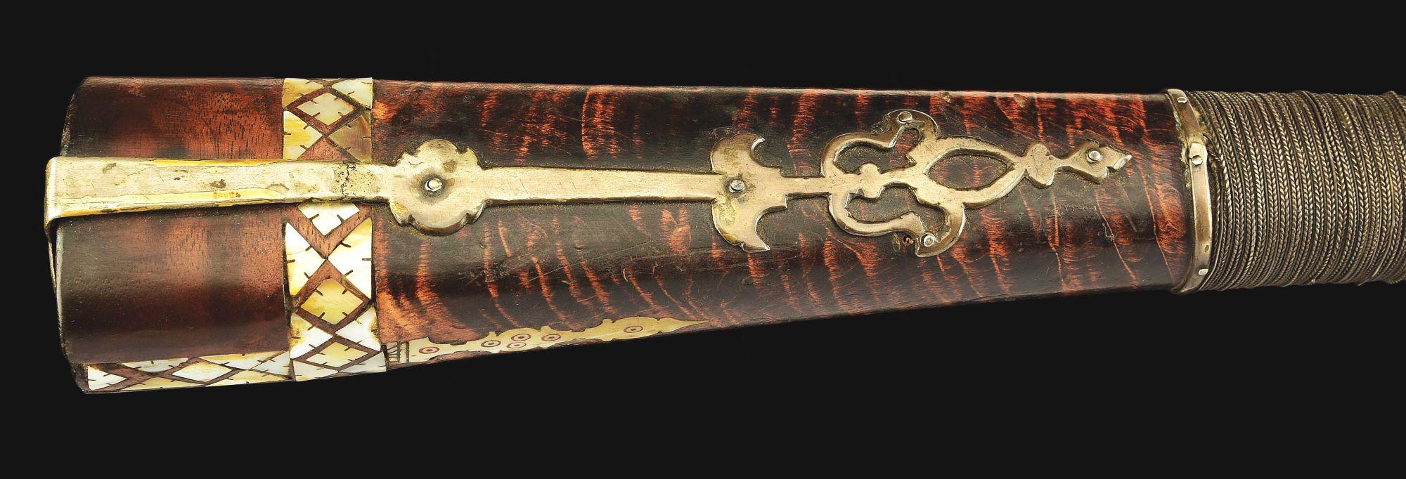 (A) AN ATTRACTIVE AND HIGHLY DECORATED CAUCASIAN MIQUELET LOCK RIFLE.