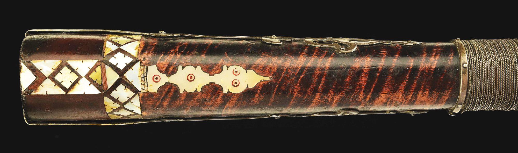 (A) AN ATTRACTIVE AND HIGHLY DECORATED CAUCASIAN MIQUELET LOCK RIFLE.