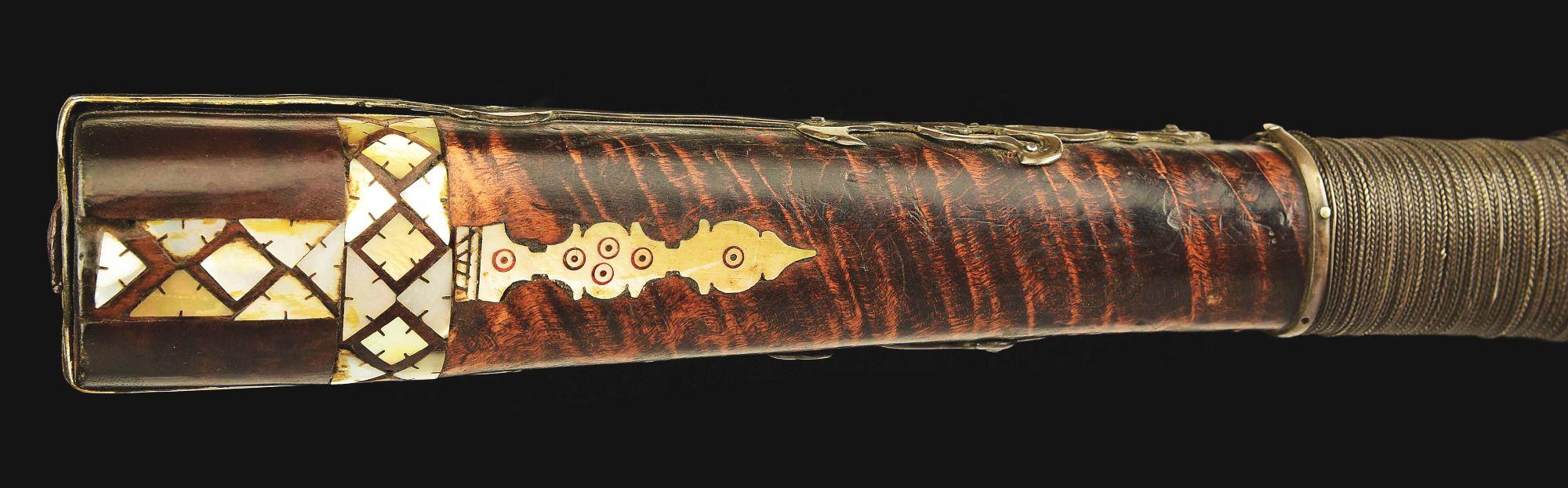 (A) AN ATTRACTIVE AND HIGHLY DECORATED CAUCASIAN MIQUELET LOCK RIFLE.