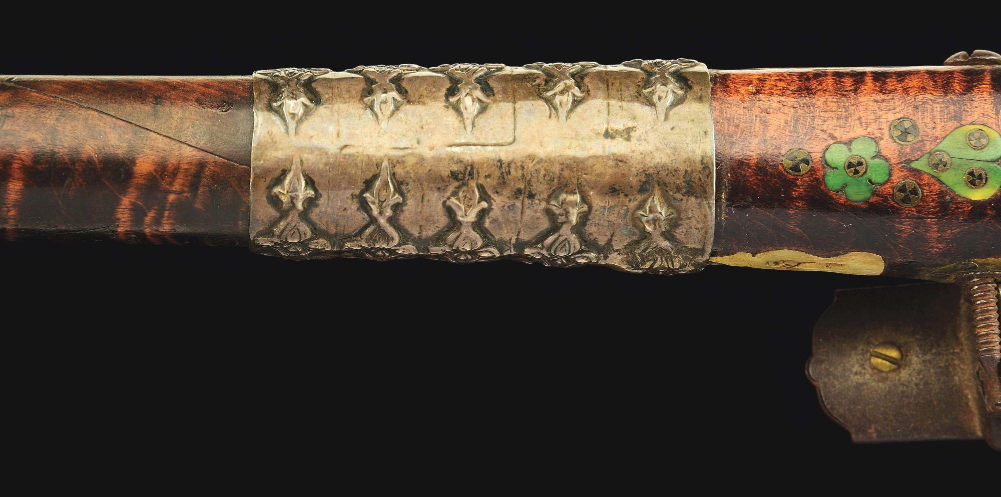 (A) AN ATTRACTIVE AND HIGHLY DECORATED CAUCASIAN MIQUELET LOCK RIFLE.