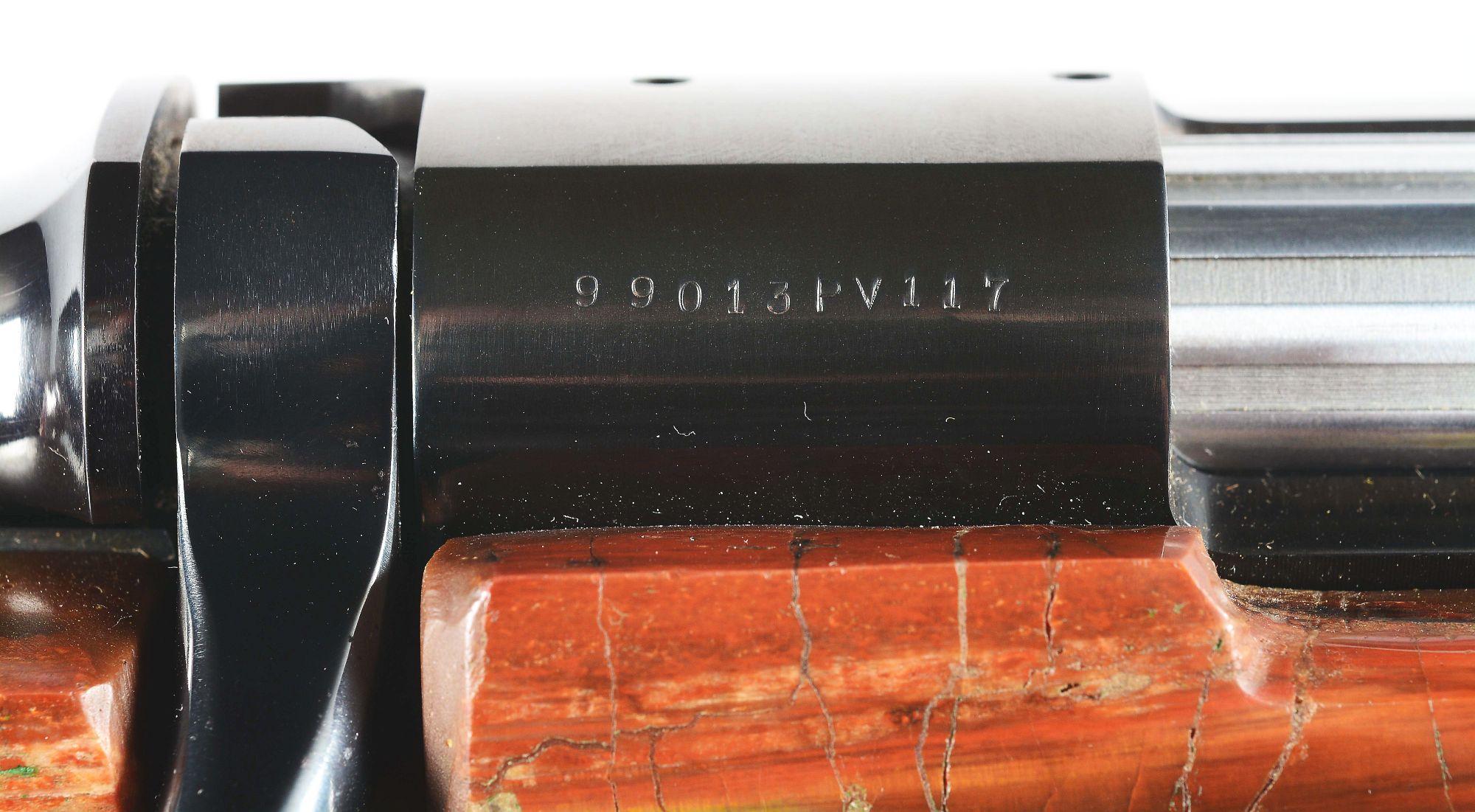 (M) PETRIFIED WOOD STOCKED BROWNING BBR BOLT ACTION RIFLE.