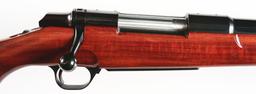 (M) AMARANTH (PELTGYNE SPP.) STOCKED BROWNING BBR BOLT ACTION RIFLE.