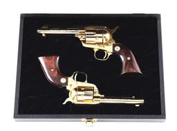 (C) CASED PAIR OF GOLD PLATED CHERRY'S SPORTING GOODS 35TH ANNIVERSARY COLT FRONTIER SCOUT & SINGLE