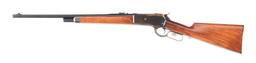 (C) WINCHESTER MODEL 1886 LEVER ACTION RIFLE.