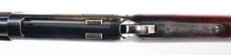 (C) WINCHESTER MODEL 1886 LEVER ACTION RIFLE.