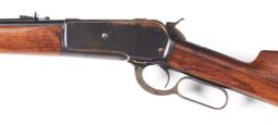 (C) WINCHESTER MODEL 1886 LEVER ACTION RIFLE.