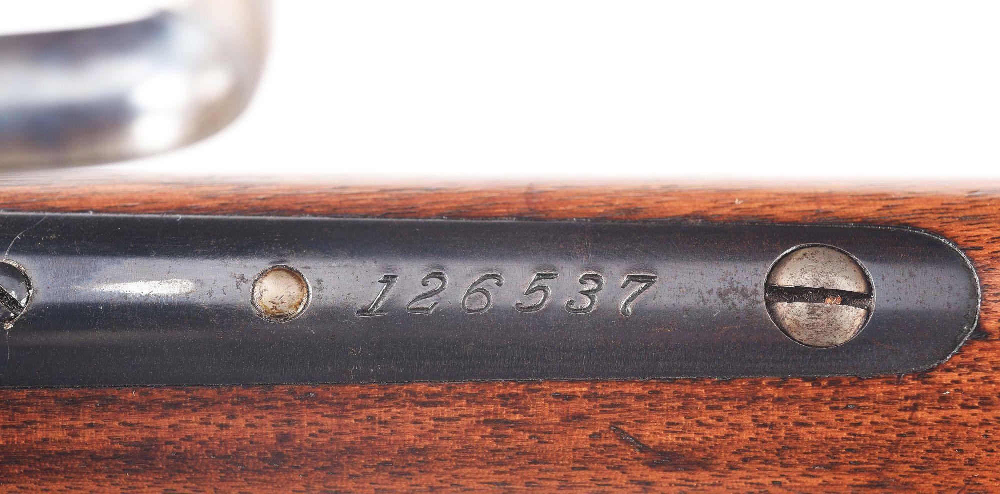 (C) WINCHESTER MODEL 1886 LEVER ACTION RIFLE.