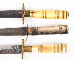 LOT OF 3: SMALL NAVAL MIDSHIPMAN'S DIRKS.