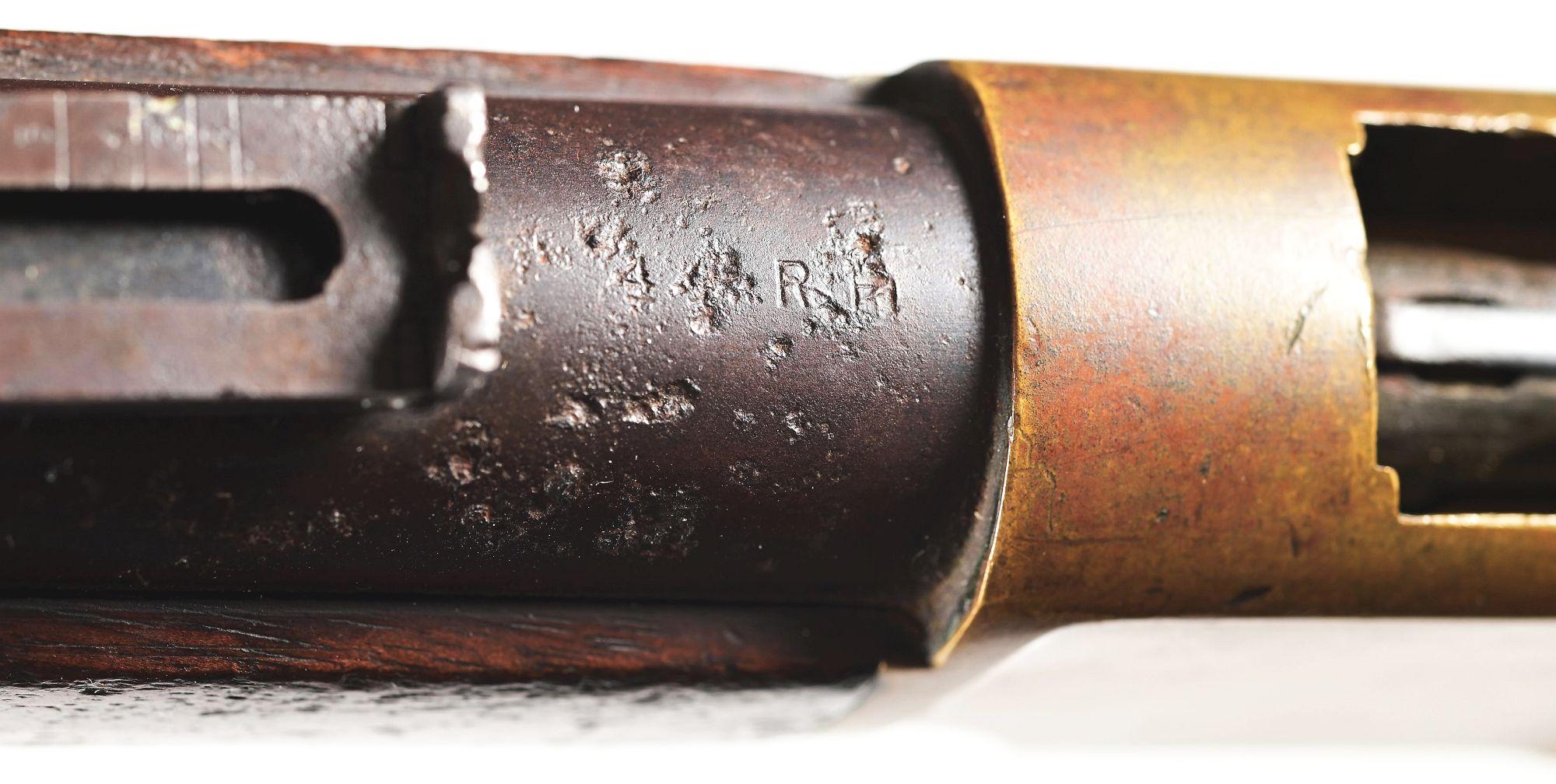 (A) WINCHESTER MODEL 1866 LEVER ACTION SADDLE RING CARBINE.
