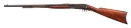 (C) REMINGTON MODEL 12 SLIDE ACTION RIFLE.