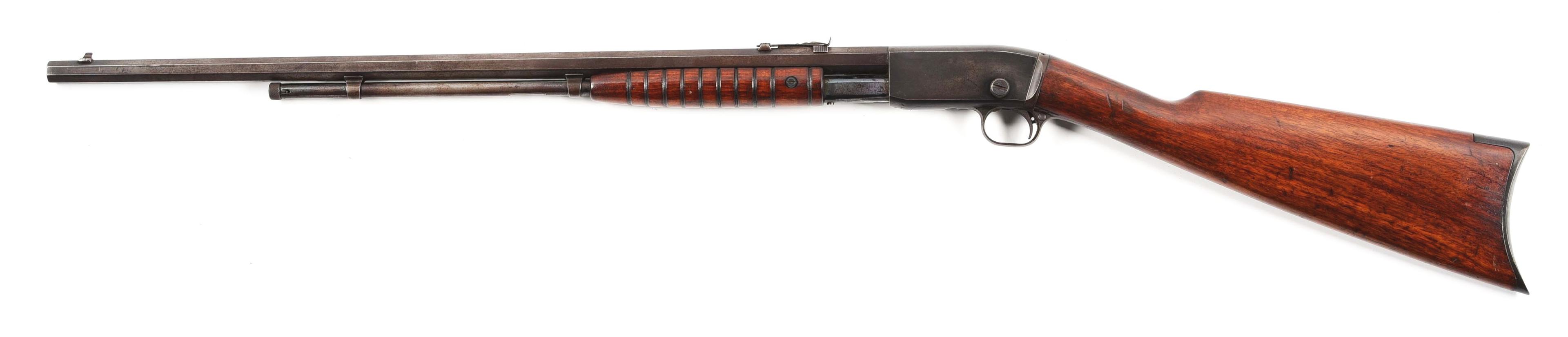 (C) REMINGTON MODEL 12 SLIDE ACTION RIFLE.