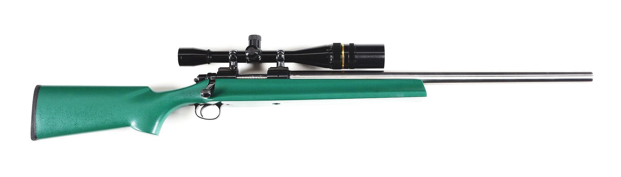 (M) REMINGTON 40XBR BOLT ACTION BENCH RIFLE WITH LEUPOLD OPTIC.