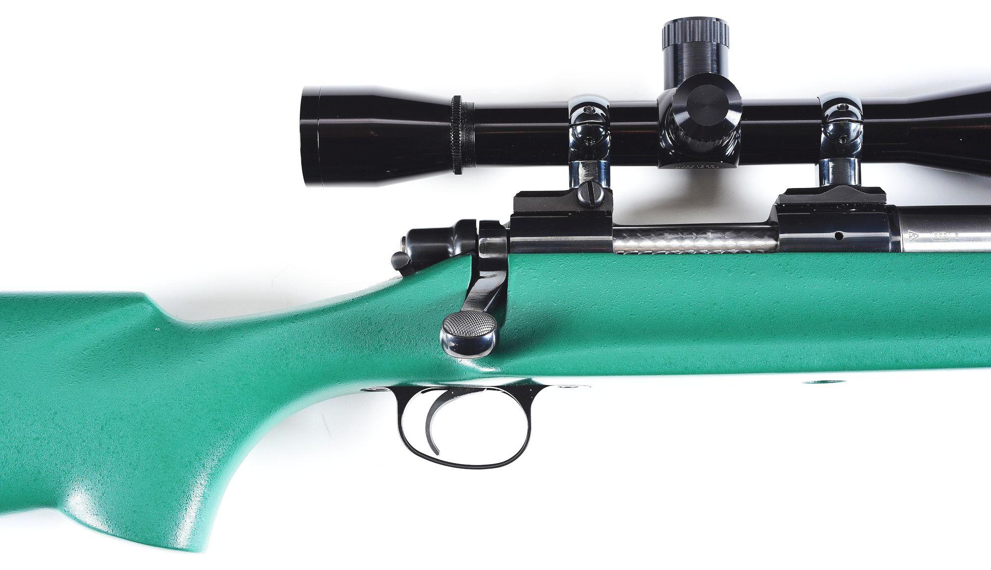 (M) REMINGTON 40XBR BOLT ACTION BENCH RIFLE WITH LEUPOLD OPTIC.